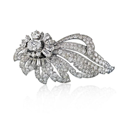 Carthttier 1950's Platinum Foliate Design with Center Cushion Cut Diamond 1.35 E/VS2 GIA Brooch